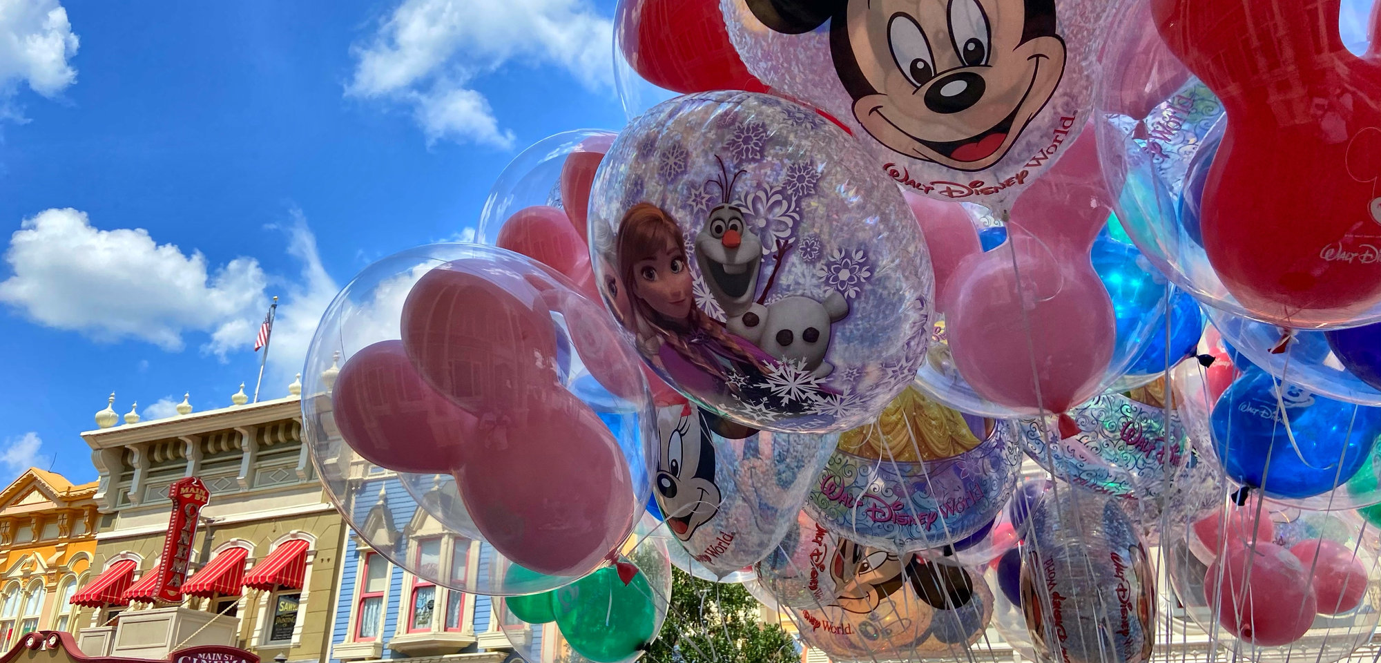 Mickey balloons floating above Main Street, U.S.A. at Walt Disney World
